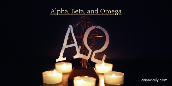 Greek alphabet letters alpha and omega plus lit candles